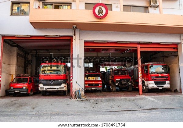 KALAMATA, GREECE - MARCH 2019: Kalamata\
fire department. Firefighting vehicles parked near fire department\
in Kalamata city, Messenia, Greece,\
Europe