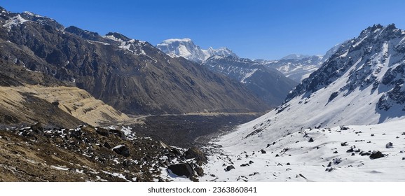 Kalapatthar, as the name implies, means “Black Stone ” in local lingo as the cliffs of the snow-clad mountain are black which add to the unique beauty of the place. With an elevation of 14,850 feet, i