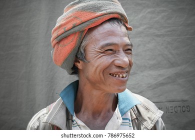 Kalaw, Taunggyi District, Shan State, Myanmar. 17 August, 2016. Documentary. Portrait Of Old Man Wearing  Towel On His Head And Smiling.