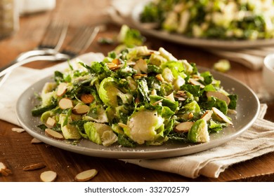 Kale And Brussel Sprout Salad With Almons And Lemon Dressing