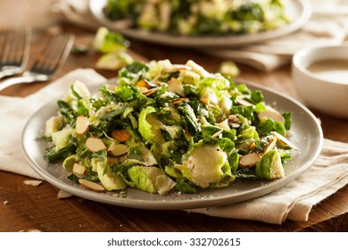 Kale And Brussel Sprout Salad With Almons And Lemon Dressing