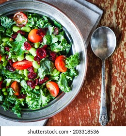 Kale And Edamame Salad On Rustic Background