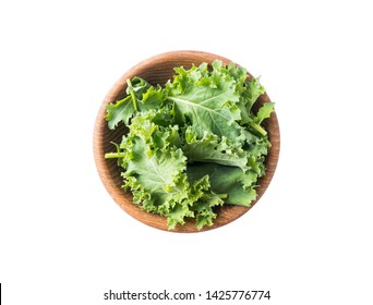 Kale leaves isolated on white background. Top view. Kale leaves with copy space for text. Herbs isolated on white. Kale on white background. Bowls of cabbage on a white background.