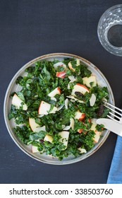 Kale Salad With Apples, Almond Slices And Raisins. Overhead View.