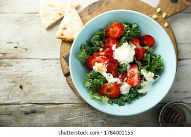 Kale Salad With Cheese And Strawberry