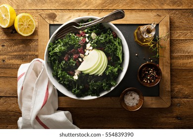 Kale Salad With Dried Cranberry, Almonds And Apple Overhead View