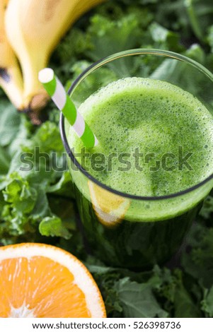 Similar – Kale smoothie with banana and orange