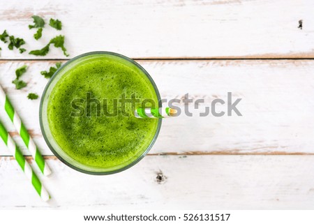 Similar – Foto Bild Grünkohl Smoothie im Glas auf weißem Holzgrund.