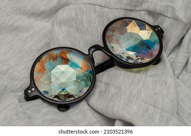kaleidoscope of designer glasses on gray textile background - Shutterstock ID 2103521396