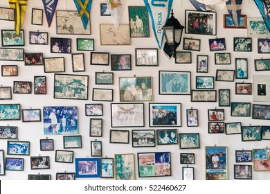 Kaleucagys, Kekova, Turkey, May 8, 2016: Many Photos In The Frames On A White Wall