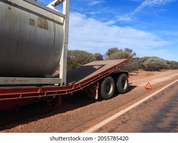 Kalgoorlie, Leonora, highway, Western Australia, 5 27 2021.
Semi trailer buckled with the weight of a chemical tank.
Road train broken down in the outback.