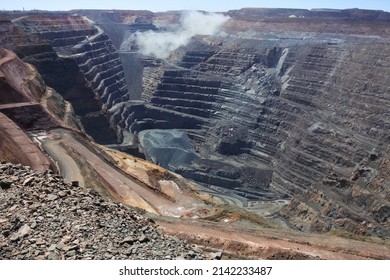 KALGOORLIE, WA - MAR 18 2022:Blast In The Fimiston Open Pit In Kalgoorlie Western Australia.Thousands Of Miners Worldwide Die From Mining Accidents Each Year.