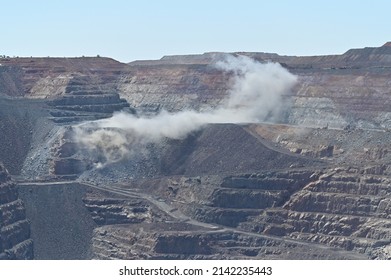 KALGOORLIE, WA - MAR 18 2022:Blast In The Fimiston Open Pit In Kalgoorlie Western Australia.Thousands Of Miners Worldwide Die From Mining Accidents Each Year.