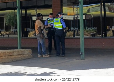 KALGOORLIE, WA - MAR 23 2022:Australian Police Officers Questioning Indigenous Man.Indigenous Australians Are Both Convicted Of Crimes And Imprisoned At A Disproportionately Higher Rate In Australia.