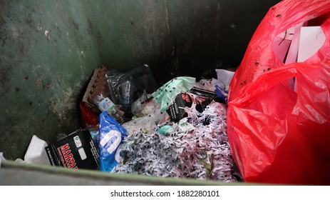 Kalideres, Indonesia - November 21,2020: Flies In The Trash,  Bin Full Of Rubbish, Overfilled Trash Dumpster