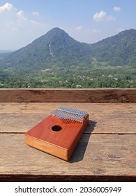 Kalimba, Acoustic Music Instrument From Africa And At Wood Desk Near Pancar Mountain, West Java Indonesia