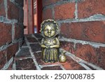 Kaliningrad, Russia, bronze statuette of homlin grandmother Martha, local landmark, city brownie