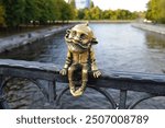 Kaliningrad, Russia, bronze statuette of homlin grandfather Karl on Honey Bridge, local landmark, city brownie