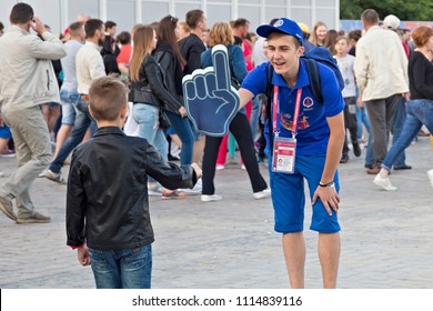 KALININGRAD, RUSSIA - JUNE 16, 2018: Young volunteers in the Kaliningrad FIFA Fan Fest zone on the days of  FIFA World Cup of 2018 in Russia.