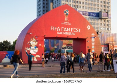 KALININGRAD, RUSSIA - JUNE 16, 2018: Unknown people near the gate of Kaliningrad FIFA Fan Fest zone on the days of  FIFA World Cup of 2018 in Russia.