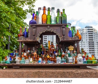 Kaliningrad, Russia, June 24, 2021. A Variety Of Souvenir Glass Vintage Bottle On A Showcase