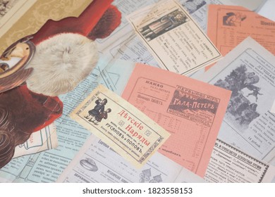 Kaliningrad, Russia-September 27,2020: Old Christmas Paper Part of a pink, blue and yellow Translation Woman's fashion Vintage Background - Shutterstock ID 1823558153