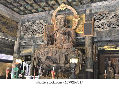 Kamakura, Japan - 19 April, 2019: Buddha hall in the Kencho-ji Temple, known as Gate of Great Luck. The site is is one of the main temples of the Rinzai school of Zen Buddhism.