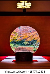 Kamakura,Japan: Viewing the garden from the round window of Japanese tatami room of  Meigetsu-in Temple in autumn.  The name of the temple means Bright Moon Temple.