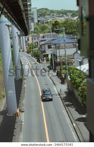 Kamakura,Shonan,Kanagawa/Japan-May 20, 2019: The nice\
view of streetscape from inside of Shonan monorail, The safege line\
travels 6.6 km between Ofuna in Kamakura and Enoshima in Fujisawa.\
