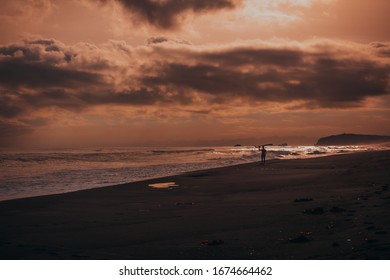 Kamchatka. Surfing At Sunset Day.