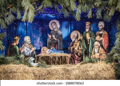 KAMIANSKE, UKRAINE - JAN 05, 2021: Christmas Manger Scene Beside St. Nicholas Church In Kamianske City. Nativity Scene With Shepherds And Characters Of The Birth Of Jesus Christ.