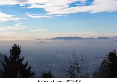 Kamnik town and valley covered with translucent morning mist. - Shutterstock ID 380750419
