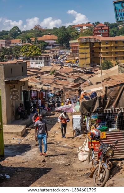 Kampala, Uganda 02 09\
2019: African Busy Crowd Of People Walking In Main Street Uganda\
Kiboga Marketplace