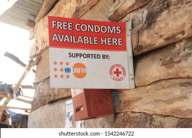 Kampala, Uganda - February 17, 2015: Red Cross Sign On The Distribution Of Free Condoms In Uganda, Africa. Sexual Education And Health Care For People In Africa.