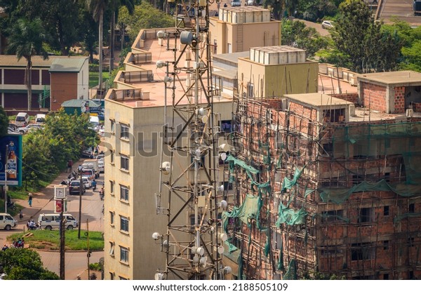Kampala, Uganda - May 20, 2022: Construction work\
in Kampala in June, big\
house