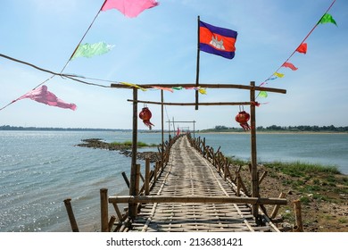 Kampong Cham, Cambodia - February 2022: The Kampong Cham bamboo bridge in Cambodia is the longest in the world on February 6, 2022 in Kampong Cham, Cambodia.