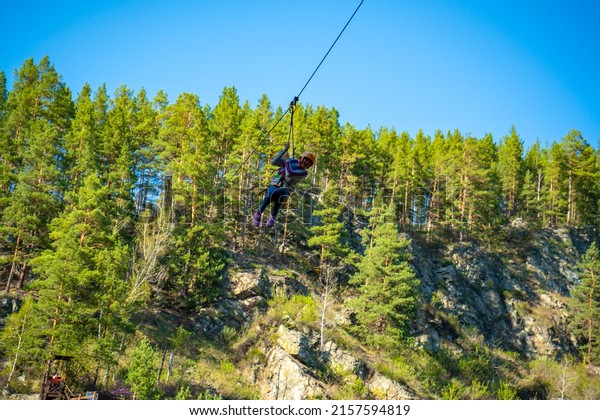 Kamysh\
waterfall in the Altai Republic, viewing platforms and a platform\
for descent on a cable rope. High quality\
photo
