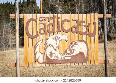 Kananaskis Alberta Canada, March 30 2022: Camp Cadicasu Summer Camp Wooden Sign On The Sibbald Flats Trail Road.