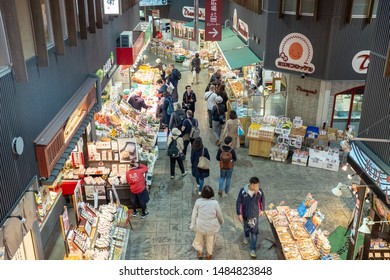 KANAZAWA, JAPAN - APRIL 10, 2018: Shoppers in the Omi-cho (Omicho) fresh food market hall in Kanazawa, Japan