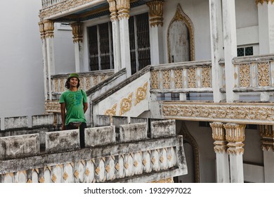 KANCHANABURI, THAILAND - JUN 1, 2018: Handsome Young Tourist, Thai Man Visitor At Art Gallery And War Museum In Kanchanaburi. Private Family Museum Established By Aran Chansiri. Travel Thailand. 