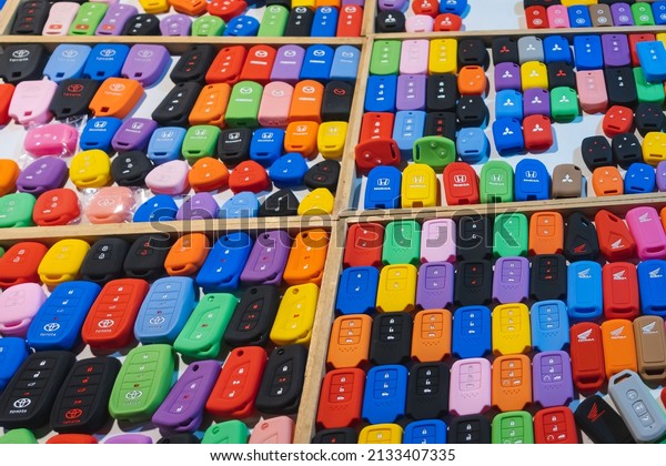 KANCHANABURI, THAILAND-NOVEMBER 28,2019 :\
Colorful of silicone cases for a keychain from the car alarm. Many\
shapes and color silicone casing for remote car keys for sale at\
local market.