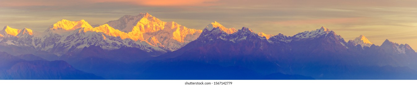 Kanchenjunga peak wearing a golden hue  at the dawn - Shutterstock ID 1567142779