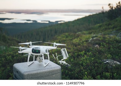 KANDALAKSHA, RUSSIA - JUNE 25, 2017: DJI Phantom 4 Pro Drone in the Mountains