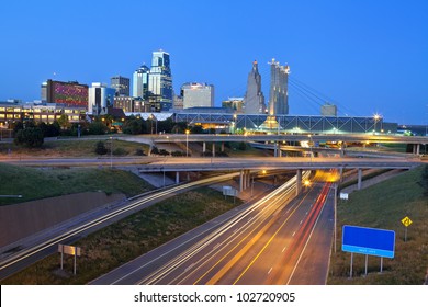 Kansas City. Image of the Kansas City skyline and busy highway system leading to the city.