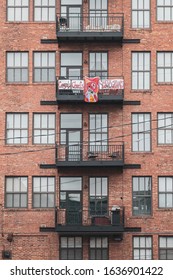 Kansas City, Missouri - February 5, 2020: Cheering On The Chiefs From The Apartment Balcony