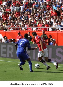 KANSAS CITY, MO July 25: Kansas City Wizards Take On English Premier League Powerhouse Manchester On July 25, 2010 In Kansas City MO. Kansas City's Shavar Thomas Defends Manchester's Dimitar