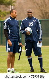 KANSAS CITY, MO - MAR 24:NFL Star Chad Ochocinco Talks With Teal Bunbury (l) After The 2nd Day Of His Trial At The Sporting KC Training Facility In Kansas City March 24, 2011