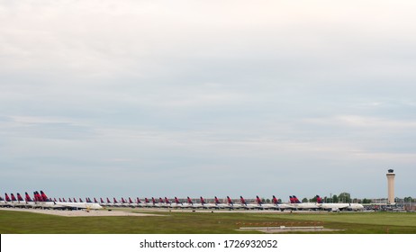 Kansas City, MO - May 9, 2020: Delta Airplanes sit in a row at Kansas City International Airport