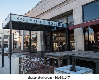 Kansas City, MO / United States Of America - February 18th, 2020 : Entrance To Extra Virgin / Michael Smith Restaurant In Downtown KC.  Storefront With Awning And Outdoor Seating.  No People In Shot.