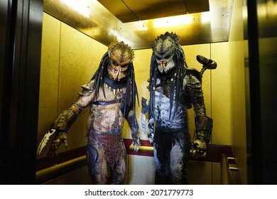 KANSAS CITY, UNITED STATES - Oct 11, 2021: Hollywood Movies Predator alien cosplay in art deco elevator